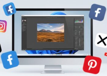ภาพประกอบหน้าปกบทความแนะนำโปรแกรมแต่งรูปฟรี windows 11 แสดงหน้าจอคอมพิวเตอร์กำลังแก้ไขภาพสินค้า โดยมีไอคอนโซเชียลมีเดียลอยอยู่รอบๆ
